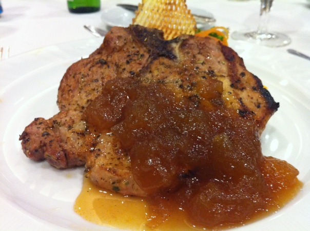 Gilled pork chop with apricot sauce, as served at the Nemacolin Woodlands Resort, Farmington, PA, USA.